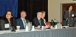 Experts sit on a Triological Society panel at COSM 2015.