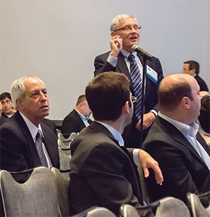 Audience members during a panel discussion.