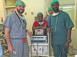 From left: Matthew Bush, MD, Catherine Irungu, MD, John Ayugi, MMED, Paul Radabaugh, MD. This donated facial nerve monitor was the first of its kind at the University of Nairobi.