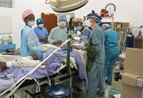 Intraoperative photo during microvascular anastamosis of fibula free flap at the Hospital Lumiere in Bonne Fin, Haiti.