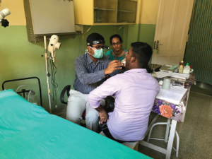 Dr. Yalamanchali and laryngology fellow Dr. Kavin Kumar during outpatient clinic at St. Thomas Hospital.