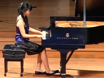 Dr. Chen at her piano.