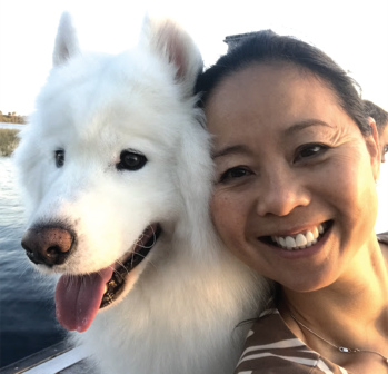 The author with her dog Shiro at Lake Nona in Orlando, Fla.