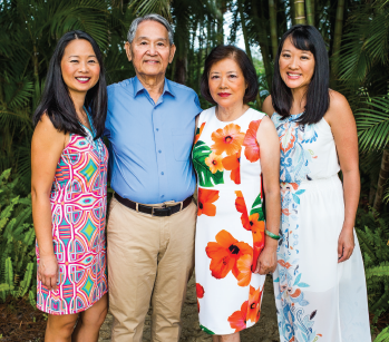 The author, Julie L. Wei, MD (left), with her parents and sister.