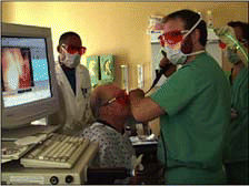 Figure. For patients who are truly reluctant to undergo general anesthesia for microlaryngoscopic polyp removal in the operating room, office-based treatment with the pulsed-KTP laser provides a viable, albeit nonoptimal, option. Steven Zeitels, MD
