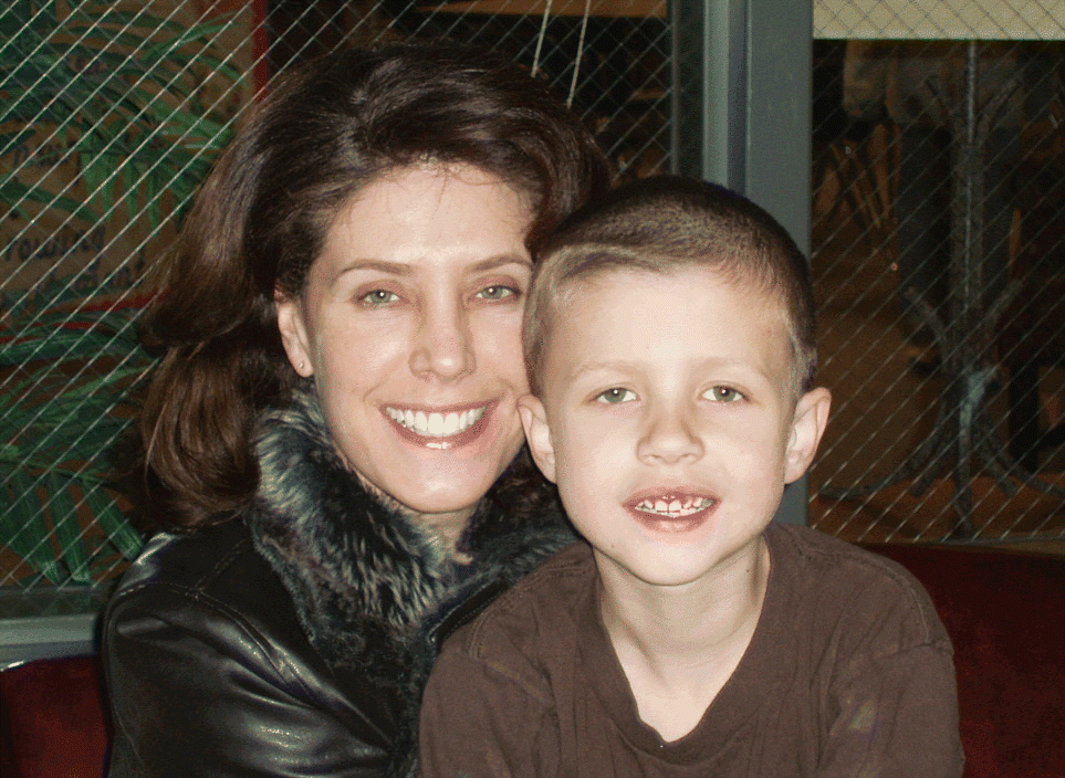 Figure. Dr. Michelle Cullen with her son Davis, age 8, who was diagnosed with an autism spectrum disorder before age 3; early treatment assisted in his successful development.