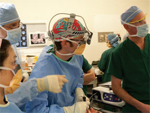 Matt Russell, MD, (center) performing a sialoendoscopy at UCSF.