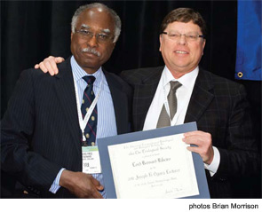 Triological Society President Gerald Berke, MD, presenting Lord Bernard Ribeiro, FRCS, FACS, with the Ogura lecture award.