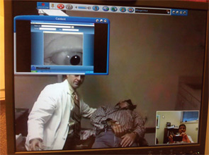 Dr. Arriaga sees telemedicine as one way to close the workforce gap. In this photo, Dr. Arriaga, who was in Pittsburgh at the time the photo was taken, is seen in the lower right corner. The patient’s eye is seen in the upper left corner. Dr. Arriaga’s otology fellow, Jeff Lacour, MD, stands alongside the patient in Baton Rouge, Louisiana. The patient is being evaluated for positional vertigo.