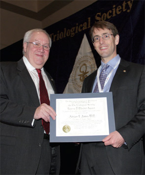 Adrian James, MD, accepts the Mosher Award